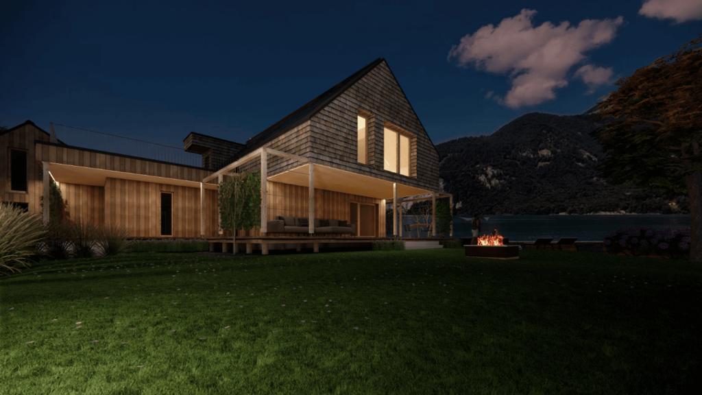 Modernes Holzhaus am Wolfgangsee mit Feuerstelle und Bergblick bei Nacht.